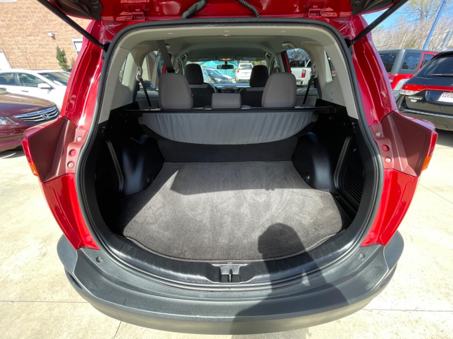 2013 Red /Silver Toyota RAV4 LE (2T3ZFREV0DW) with an 2.5L engine, Automatic transmission, located at 1501 West 15th St., Houston, 77008, (713) 869-2925, 29.797941, -95.411789 - Photo#12